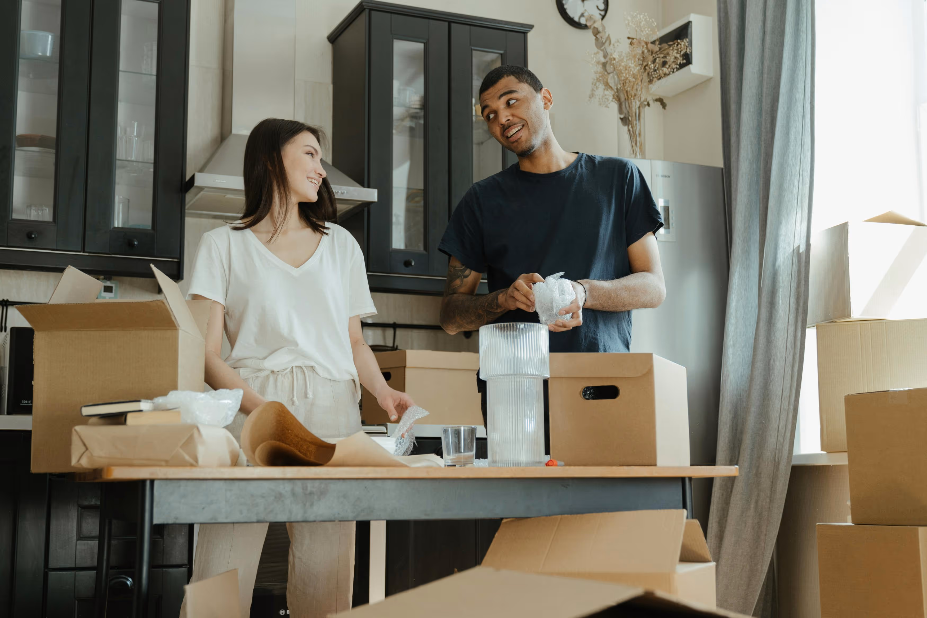 Couple reviewing refinance options at home
