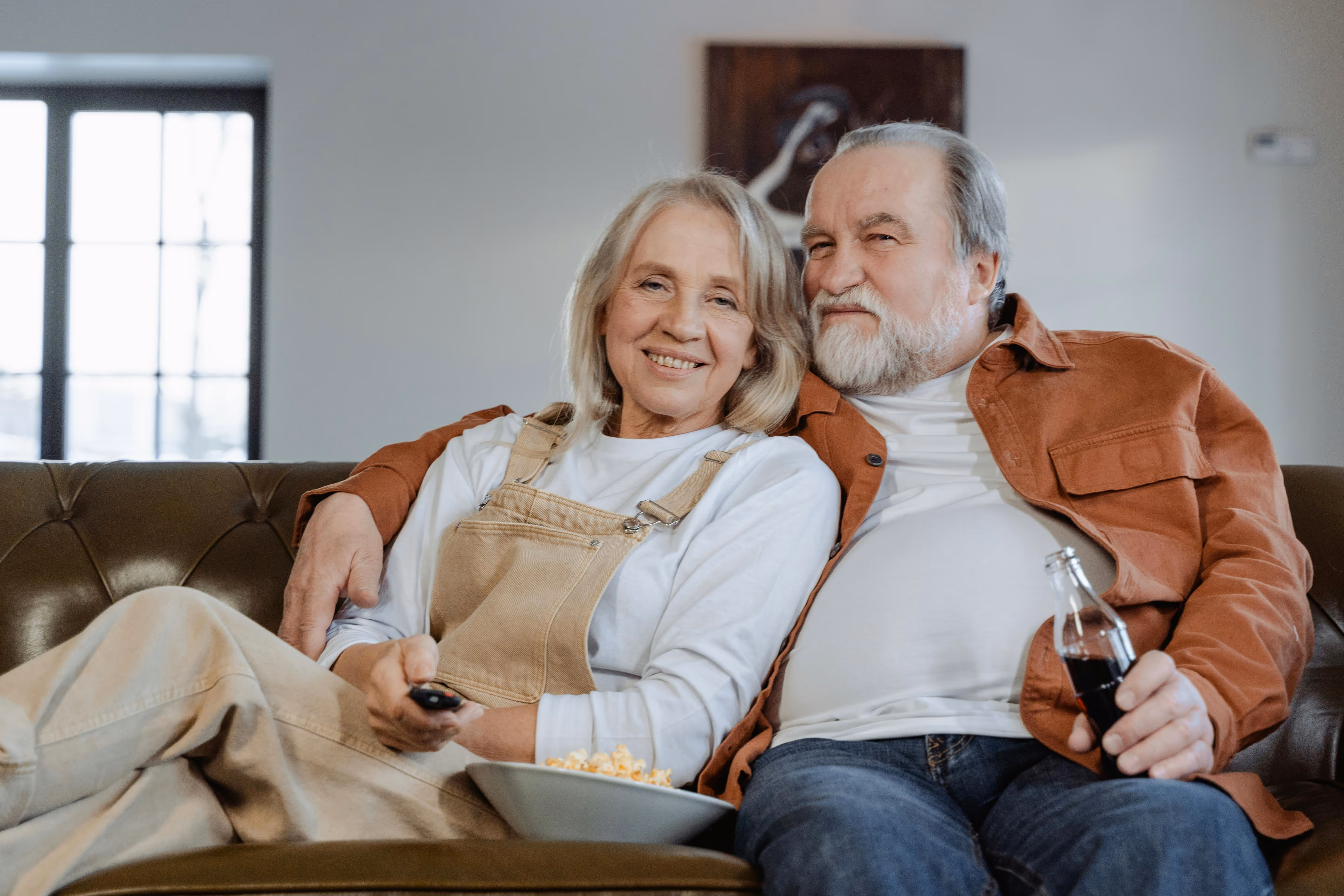 Couple reviewing refinance options from home